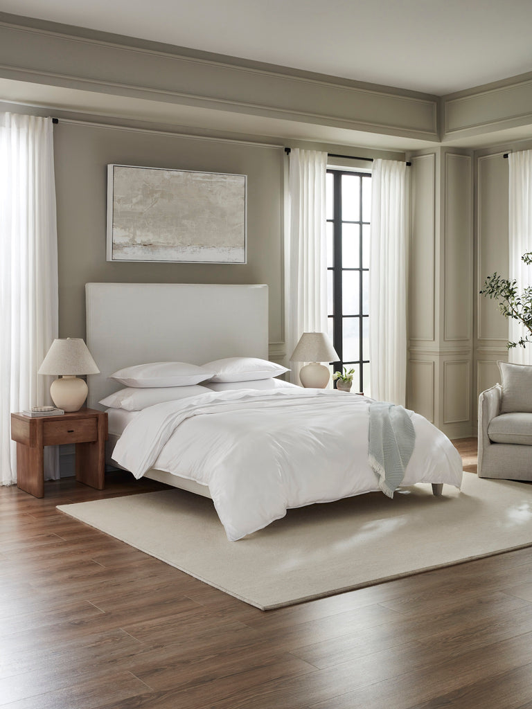 Sleep in the ultimate in luxury with our Giza 45 Corto Percale Sheets, Duvet Covers + Shams. Crafted in Italy from 100% Giza 45 Egyptian cotton, the white bedding features mini flanges and plain, clean hems for a sleek and sensible look. Experience the comfort and quality of Giza 45 Egyptian cotton.