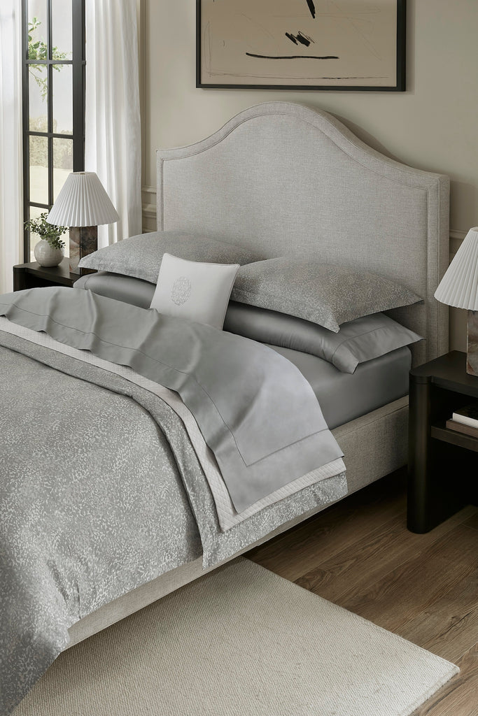 Experience the spellbinding beauty of Bione with our luxurious Duvet Covers + Shams. Crafted in Italy, the exquisite yarn-dyed sateen jacquard showcases a rich textural pattern in a palette of slate blue, taupe, and grey. Made with 100% long-staple cotton, this soft and medium-weight fabric invites you to explore its tactile allure.