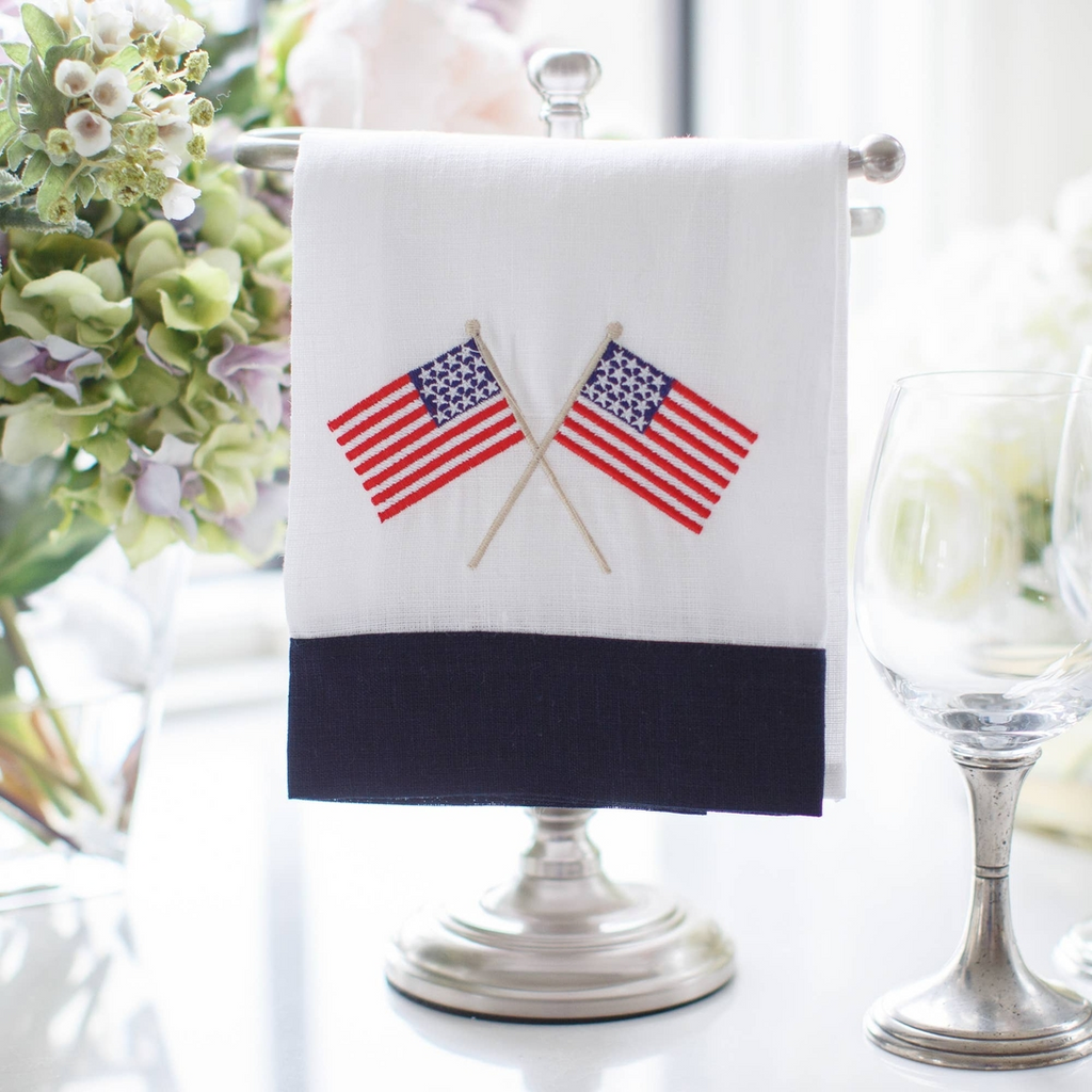 This American Flag Linen Towel is a must-have for any home. Made from 100% European linen and embroidered with delicate American flags, this guest towel is a perfect addition to your kitchen or bath. Measuring 17x29", it's a versatile way to add a touch of patriotism to any space. Made in Ukraine.