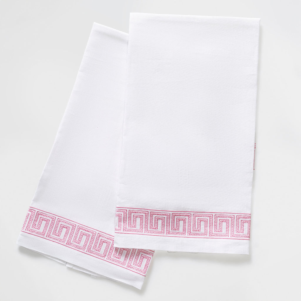 The Ophelia Guest Towels are the epitome of luxury and sophistication. Made from 100% linen, the towels feature an elegant Greek key pattern with meticulously peony pink embroidered lines and dots inspired by Schumacher's beaded tape. These towels will elevate any bathroom with their classic design.