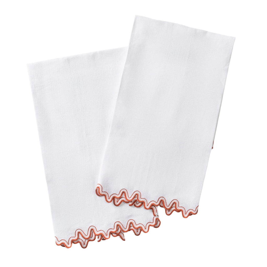 Introduce a touch of elegance to your bathroom with Matouk's Wave Guest Towels. Intricately embroidered on crisp white linen, these towels feature a two-tone wave design in Carnelian Red. Made with 100% OEKO-TEX® Standard 100 certified linen, they are both luxurious and eco-friendly.