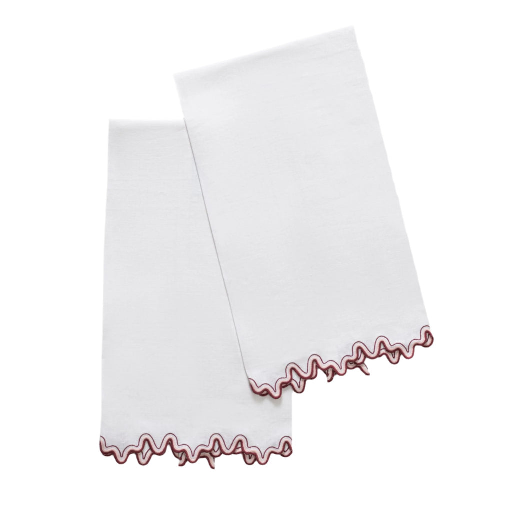 Introduce a touch of elegance to your bathroom with Matouk's Wave Guest Towels. Intricately embroidered on crisp white linen, these towels feature a two-tone wave design in Paradise Pink. Made with 100% OEKO-TEX® Standard 100 certified linen, they are both luxurious and eco-friendly.