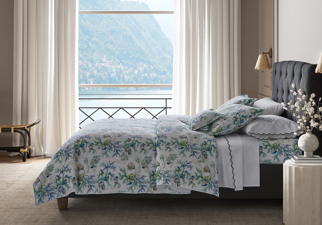 Experience the ultimate luxury with Del Tesoro sheets, duvet covers, and shams. Celebrating the underwater world with vibrant sea blue coral and playful motifs, this collection is crafted from luxurious Egyptian cotton, woven and printed in Italy. Elevate your bedding to new depths of elegance and sophistication