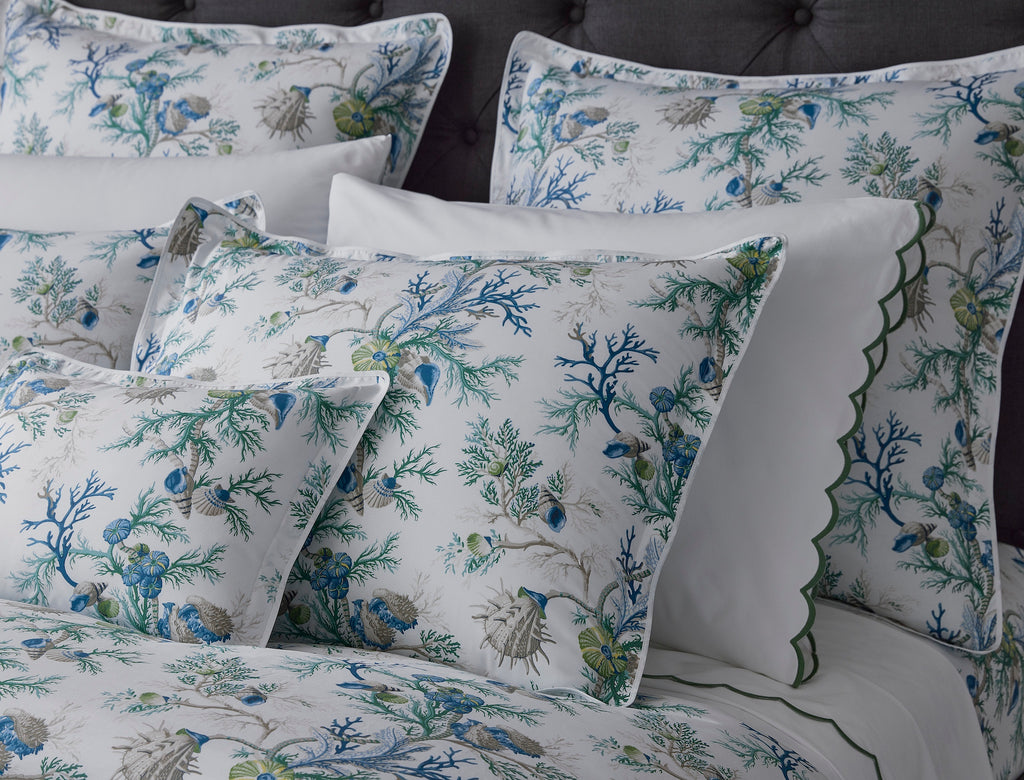 Experience the ultimate luxury with Del Tesoro sheets, duvet covers, and shams. Celebrating the underwater world with vibrant sea blue coral and playful motifs, this collection is crafted from luxurious Egyptian cotton, woven and printed in Italy. Elevate your bedding to new depths of elegance and sophistication