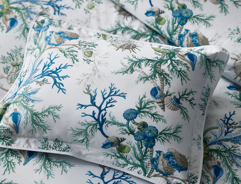 Experience the ultimate luxury with Del Tesoro sheets, duvet covers, and shams. Celebrating the underwater world with vibrant sea blue coral and playful motifs, this collection is crafted from luxurious Egyptian cotton, woven and printed in Italy. Elevate your bedding to new depths of elegance and sophistication