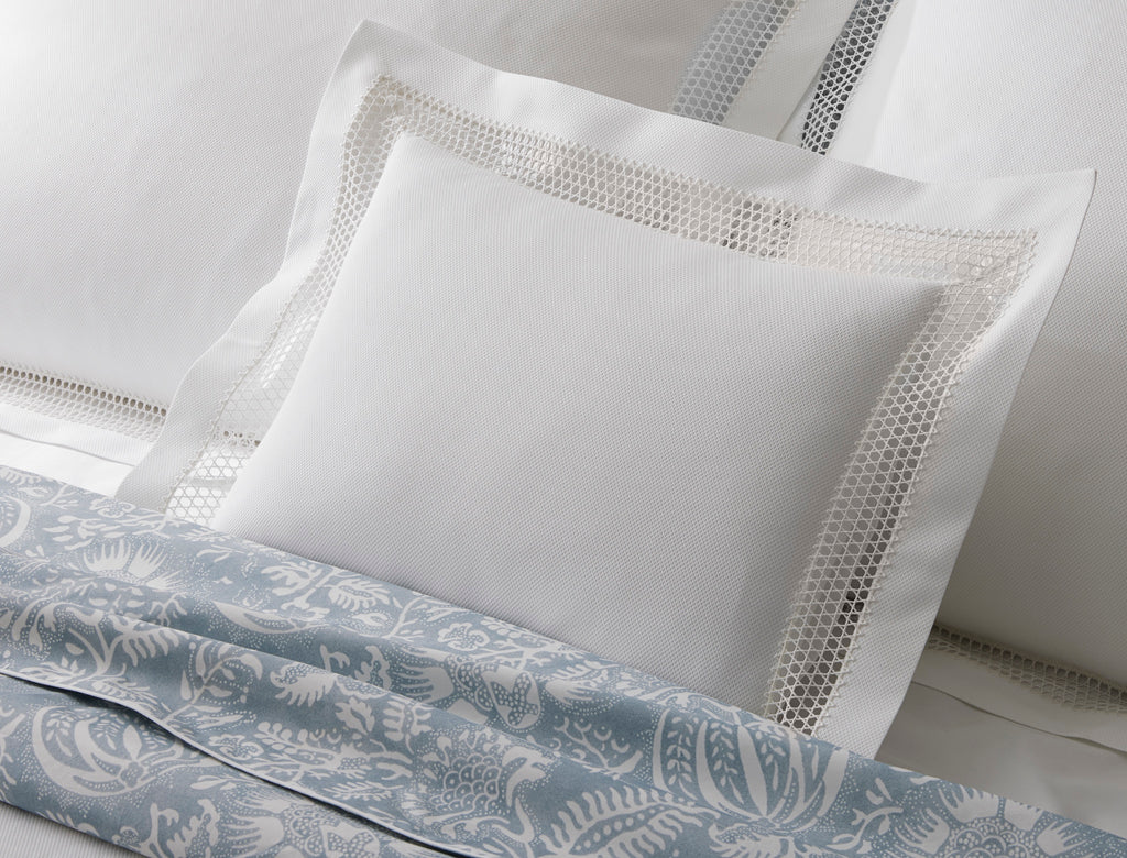 Introducing the Cecily Lace Pique Coverlet and Shams from Matouk, a perfect combination of timeless style and intricate detailing. Made with 100% cotton pique and finished with delicate white Swiss lace, this lightweight layer adds a polished finish to any bed.