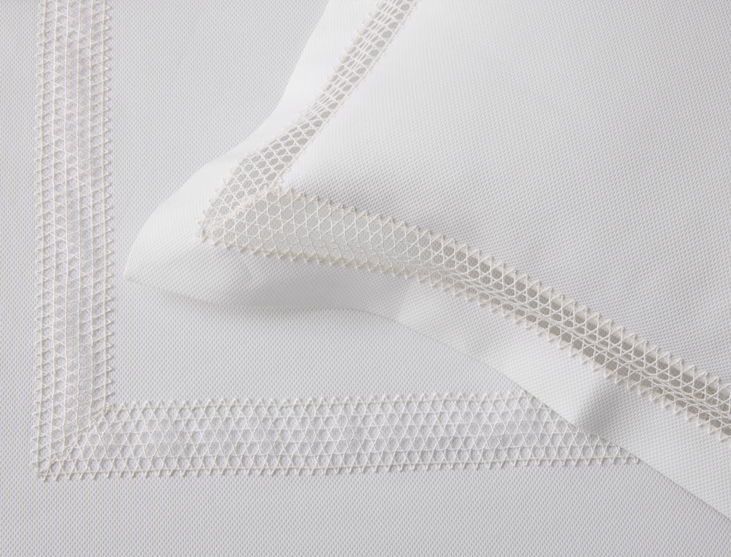 Introducing the Cecily Lace Pique Coverlet and Shams from Matouk, a perfect combination of timeless style and intricate detailing. Made with 100% cotton pique and finished with delicate white Swiss lace, this lightweight layer adds a polished finish to any bed.