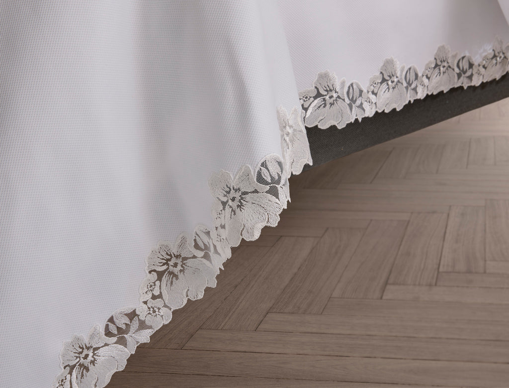 Simple elegance is created with Matouk's Virginia Lace Pique Coverlet + Shams. Made from 100% cotton pique with exquisite Swiss lace detailing, this lightweight coverlet adds a feminine and romantic touch to any bed.