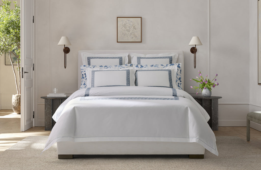 Experience the luxury of Matouk's Ophelia Flat Sheet. Crafted from crisp white 520 thread count Ceylon percale, these sheets feature a timeless Greek pattern reimagined with intricate embroidery. Mix and match with an array of colors for a stunning addition to any bedroom.