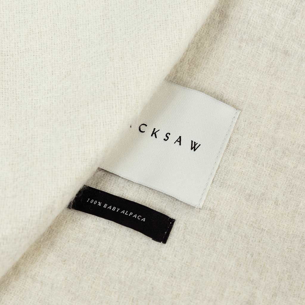 A perfect balance of style and sustainability. Blacksaw's Elder Zero Dye Reversible Throw, made from 100% natural, hypoallergenic baby alpaca fibers. Modern & earth-inspired, featuring art by Bailey Elder. Lightweight, moisture-wicking and free of dyes. No animals were harmed in creating this eco-friendly blankets.