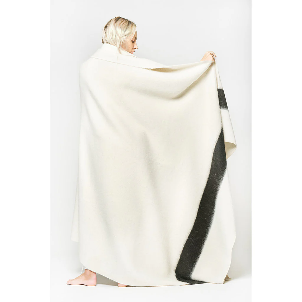 Expertly crafted with sustainability in mind, The Siempre Recycled Blanket is the perfect addition to any fireside evening. Made from 100% recycled, eco-friendly fibers, this heavyweight blanket not only provides warmth but also helps reduce waste in landfills. Snuggle up guilt free.