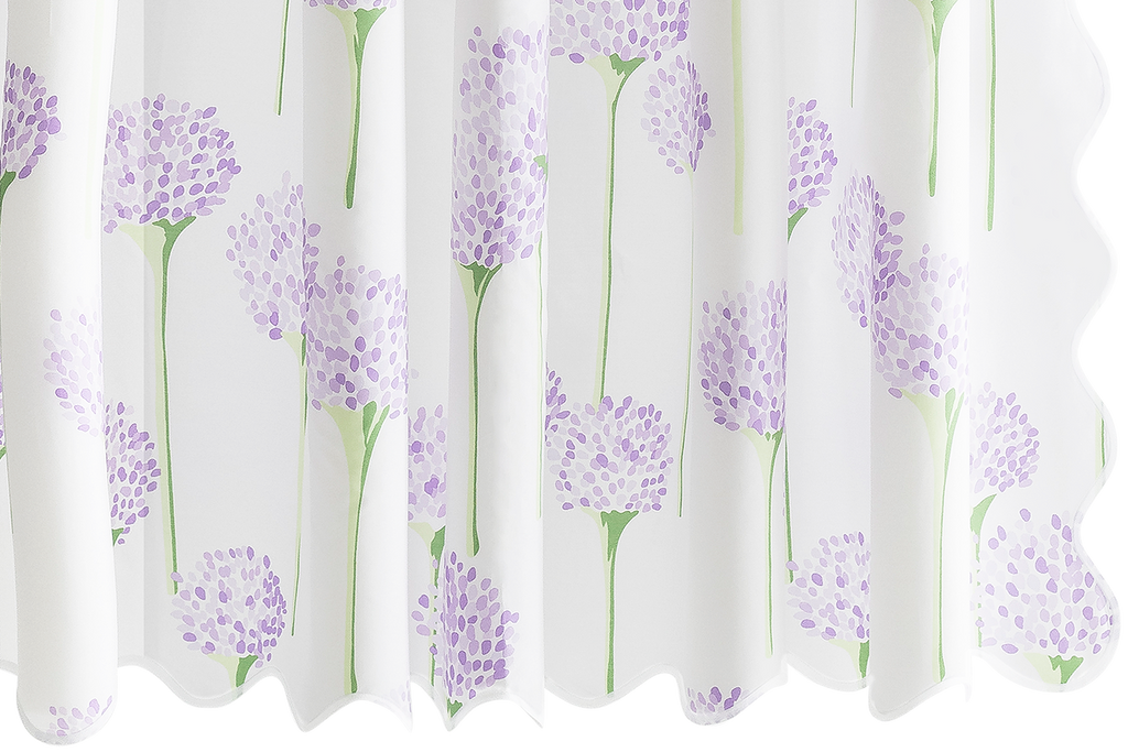 Introducing the Charlotte Shower Curtain, a Matouk mainstay. Made of luxurious white Egyptian cotton, this shower curtain boasts an all-over pattern of blue or lavender allium flowers, designed by Lulu DK. With a long wave scallop and complementing tape color, it's a timeless and elegant addition to your bathroom.