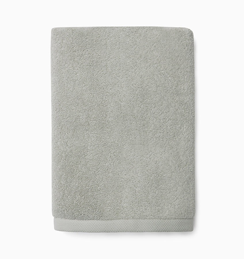 Experience the ultimate in comfort with Sferra's Cielo bath towels and tub mat. Made with the finest long staple cotton and zero-twist yarn, these towels are incredibly absorbent and feel weightless. The result? A heavenly softness that shines with a lustrous surface and catches the light. Indulge in luxury every time you use them. Platinum Silver Hand Towel