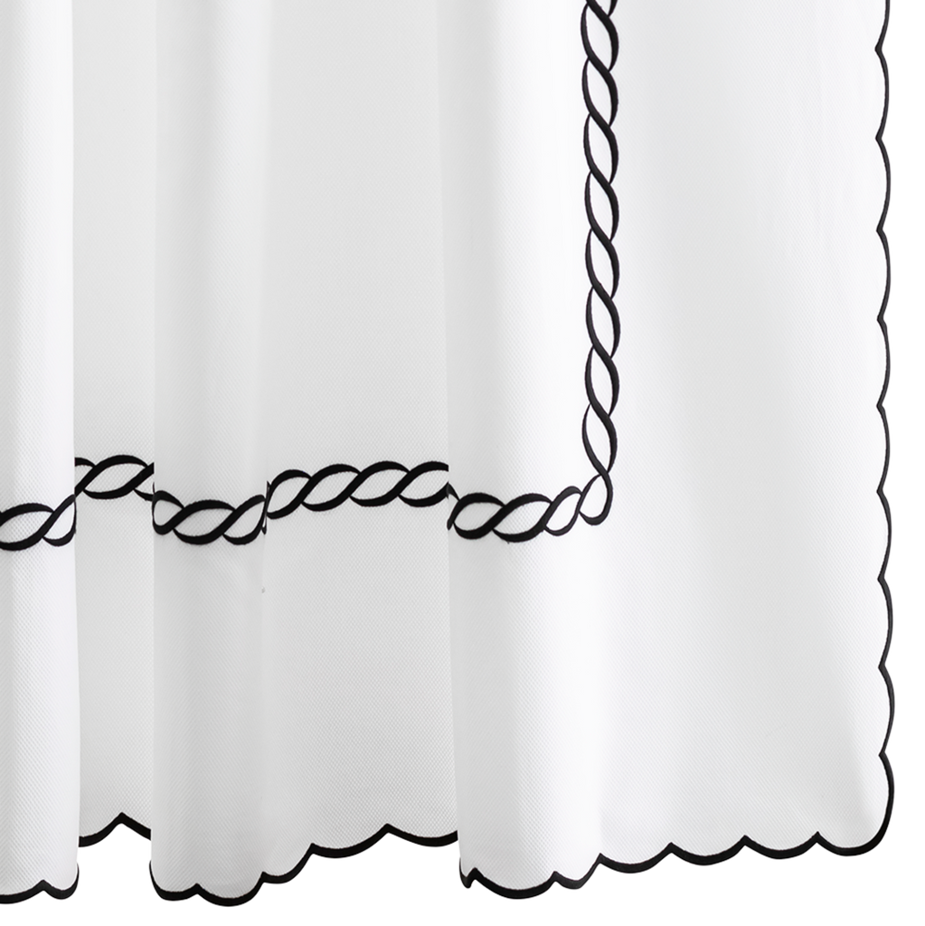 The Classic Chain Scallop shower curtain is a timeless addition to any bathroom. Made from high-quality 100% cotton pique fabric, its intricate chain Black embroidery in detailing and scalloped edge design exude elegance and sophistication. Transform your shower space with this classic and durable curtain.