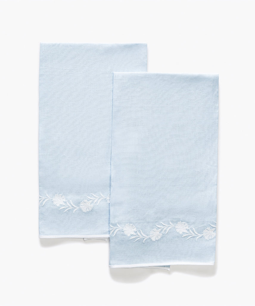 Matouk Daphne Guest Towels in Sky Blue linen with white floral embroidery