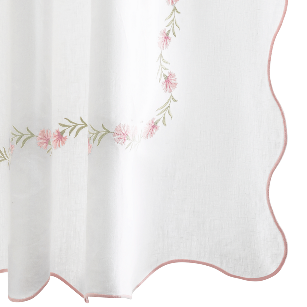 Elevate your bathroom with Matouk's Daphne Shower Curtain. Crafted from 100% linen, it features intricate blush pink floral embroidery for an elegant touch. Designed in the Philippines with fabric from Portugal, this shower curtain is also certified by OEKO-TEX® Standard 100. Enjoy the joy and durability it brings to your home.