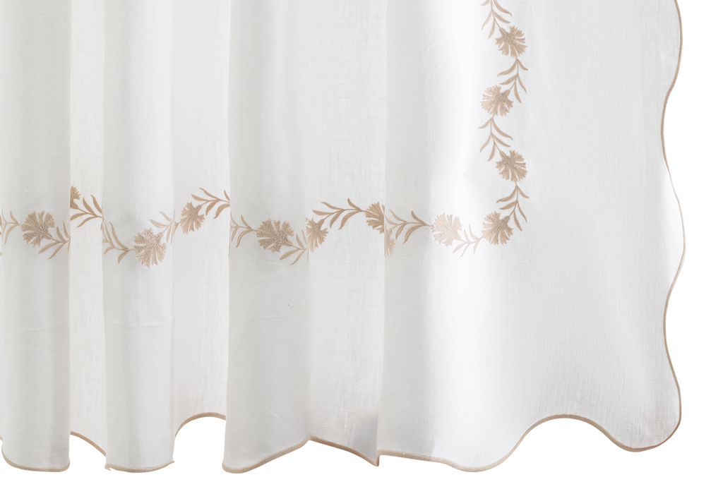 Elevate your bathroom with Matouk's Daphne Shower Curtain. Crafted from 100% linen, it features intricate dune tan floral embroidery for an elegant touch. Designed in the Philippines with fabric from Portugal, this shower curtain is also certified by OEKO-TEX® Standard 100. Enjoy the joy and durability it brings to your home.