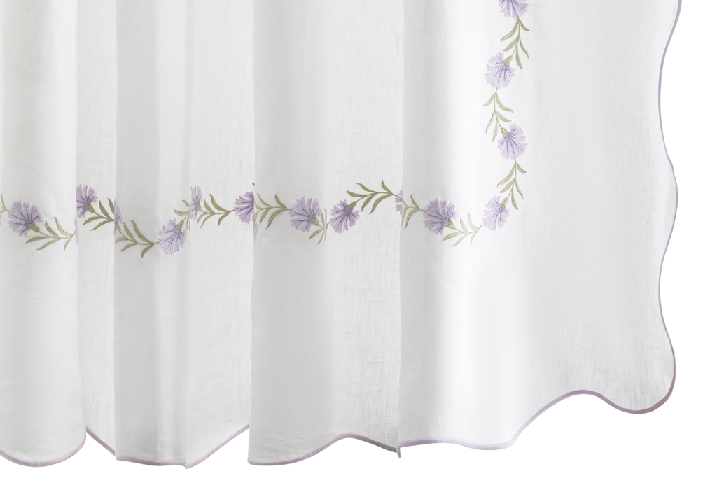 Elevate your bathroom with Matouk's Daphne Shower Curtain. Crafted from 100% linen, it features intricate lilac floral embroidery for an elegant touch. Designed in the Philippines with fabric from Portugal, this shower curtain is also certified by OEKO-TEX® Standard 100. Enjoy the joy and durability it brings to your home.