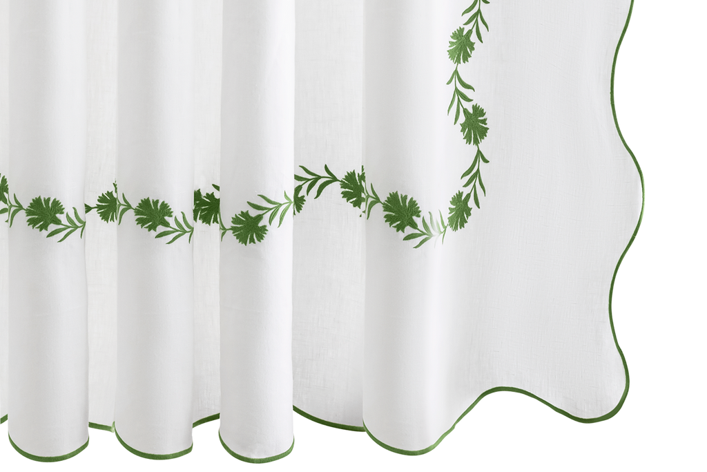 Elevate your bathroom with Matouk's Daphne Shower Curtain. Crafted from 100% linen, it features intricate palm green floral embroidery for an elegant touch. Designed in the Philippines with fabric from Portugal, this shower curtain is also certified by OEKO-TEX® Standard 100. Enjoy the joy and durability it brings to your home.