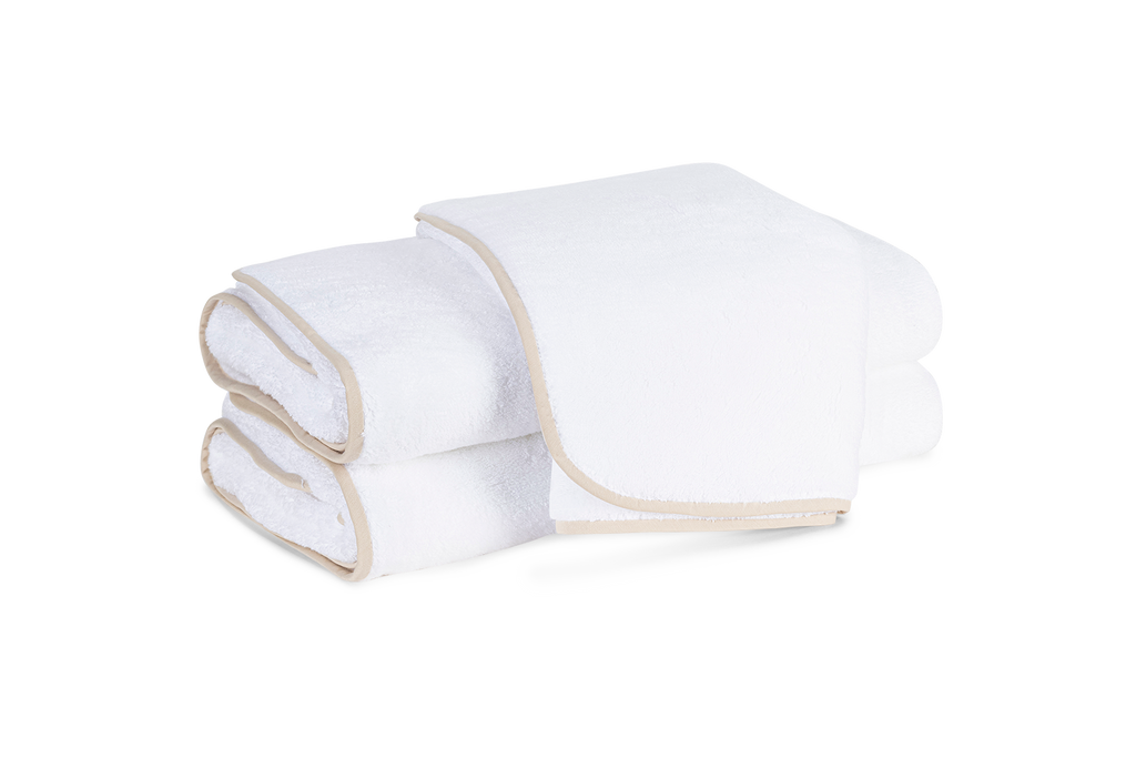 Matouk's Giza bath towels feature cotton that is grown in Egypt, woven in Portugal, then sewn in the USA. Giza is the best quality extra long staple cotton. This extraordinary Egyptian cotton is grown in the Nile River Valley, producing a product that is soft and smooth to the hand and ultra absorbent and long-lasting. White Terry with Sand Trim