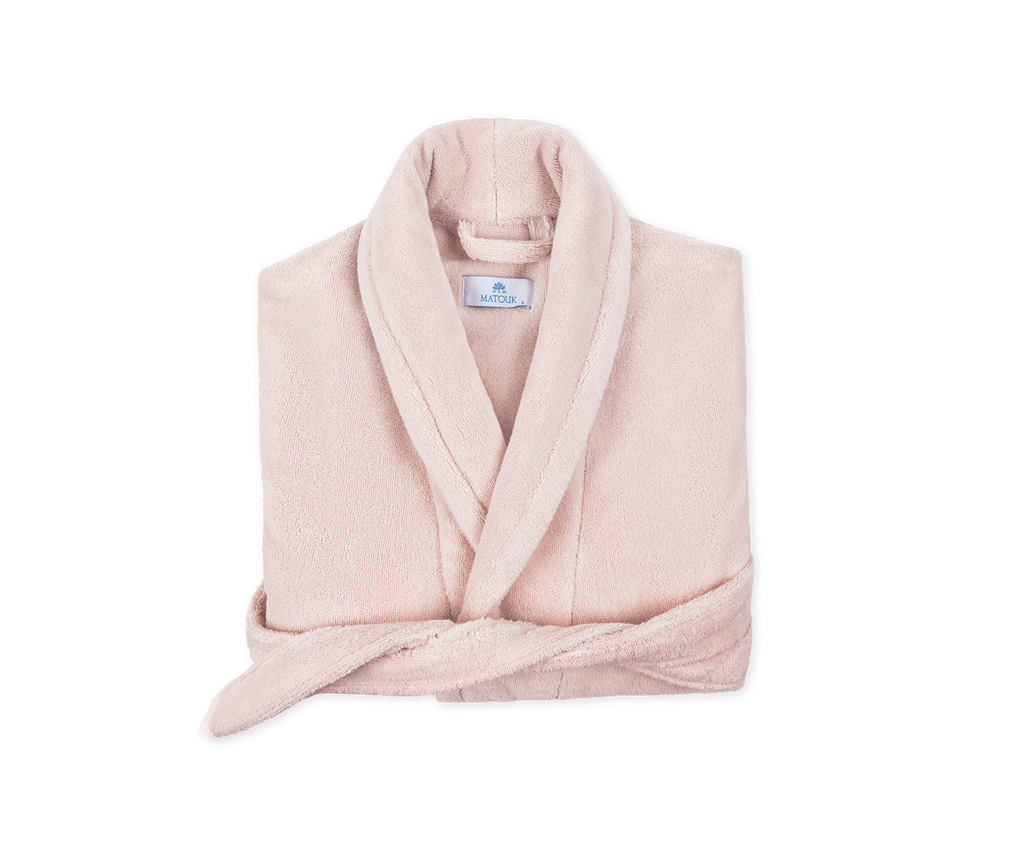 Introducing the luxuriously soft and cozy Milagro Bath Robe from Matouk. Made with 100% zero twist cotton, this unisex robe features a shawl collar and two ample sized pockets. Available in Petal Pink this robe is the perfect addition to your daily routine. Made in Turkey.