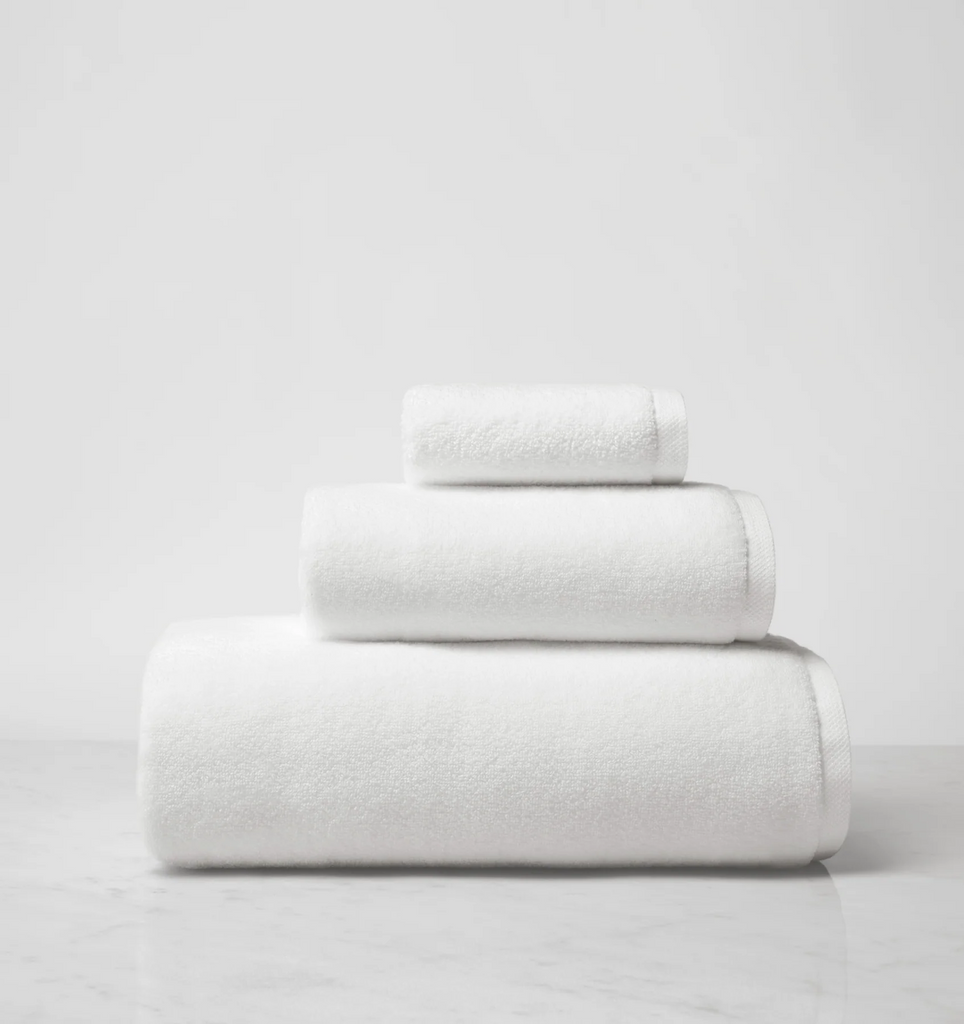 Experience the ultimate in comfort with Sferra's Cielo bath towels and tub mat. Made with the finest long staple cotton and zero-twist yarn, these towels are incredibly absorbent and feel weightless. The result? A heavenly softness that shines with a lustrous surface and catches the light. Indulge in luxury every time you use them.