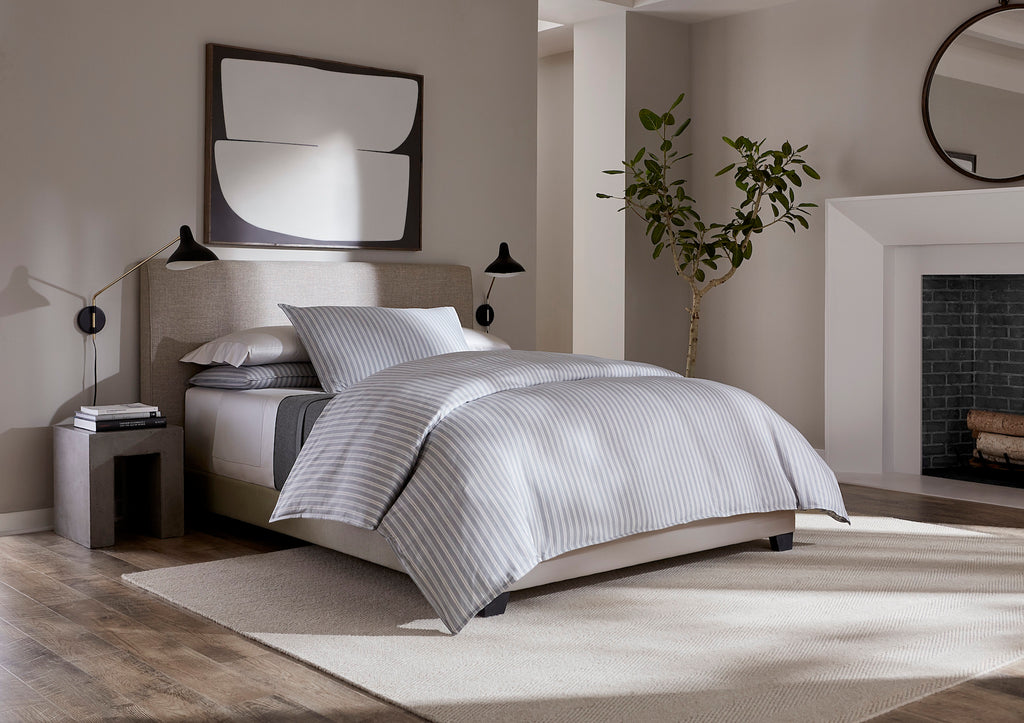 Indulge in luxury with our Leranto Sheets, Duvet Covers + Shams. Made from 100% extra long-staple cotton, the yarn-dyed sateen jacquard fabric gives a softly textured feel. The minimalist palette of titanium, adorned with understated stripes, exudes elegance and sophistication. Made in Italy.