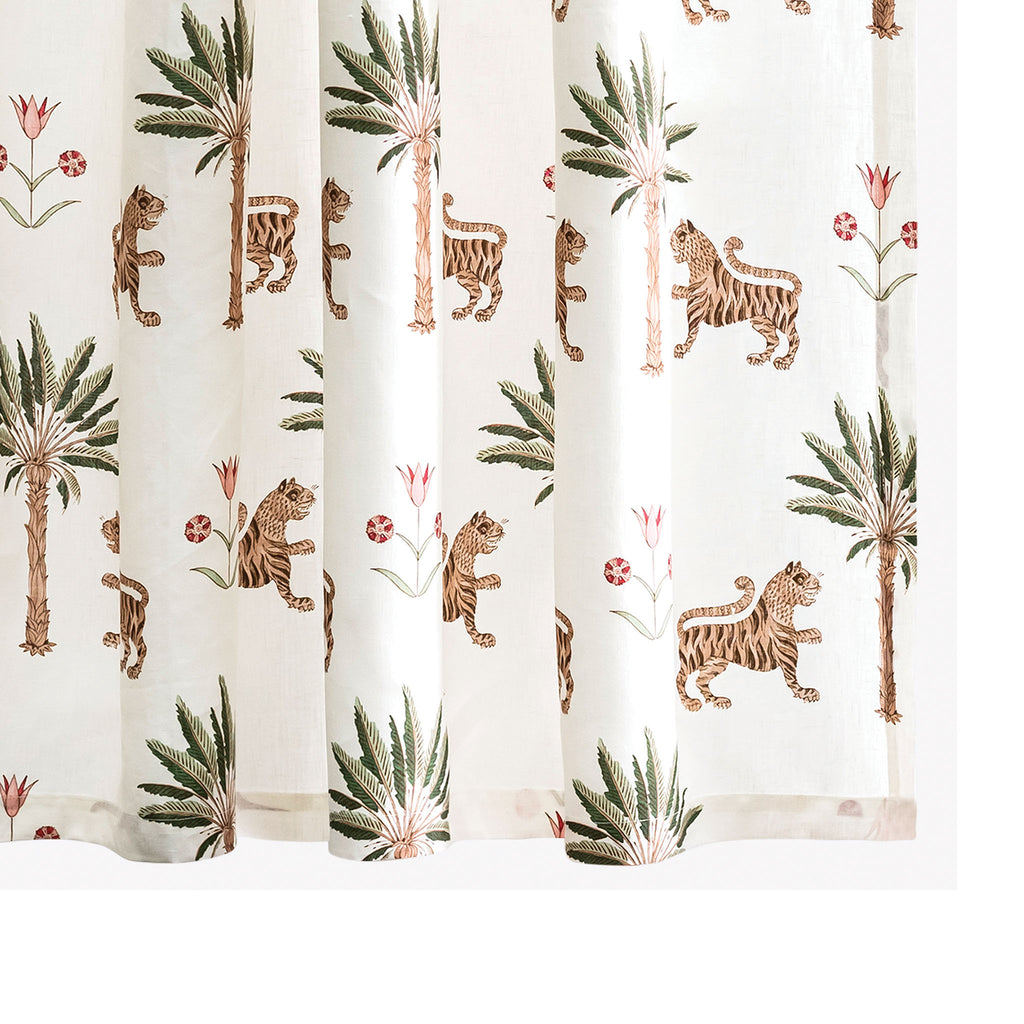 Transform your bathroom into a playful oasis with Matouk's Tiger Palm Shower Curtain. Made from 100% linen, featuring a Schumacher inspired block print design, this curtain adds a sophisticated touch. Soothing tones and quirky elements (think palm trees and tigers) make for a unique addition to your daily routine.