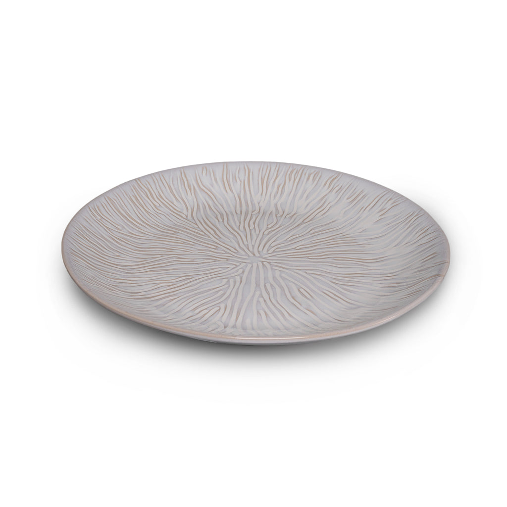 This elegant Harvest Field Platter is perfect for serving up your favorite autumn dishes. With its spacious design and durable construction, it's the ideal choice for any fall gathering. Impress your guests and elevate your dining experience with the Harvest Field Platter by Simon Pearce.