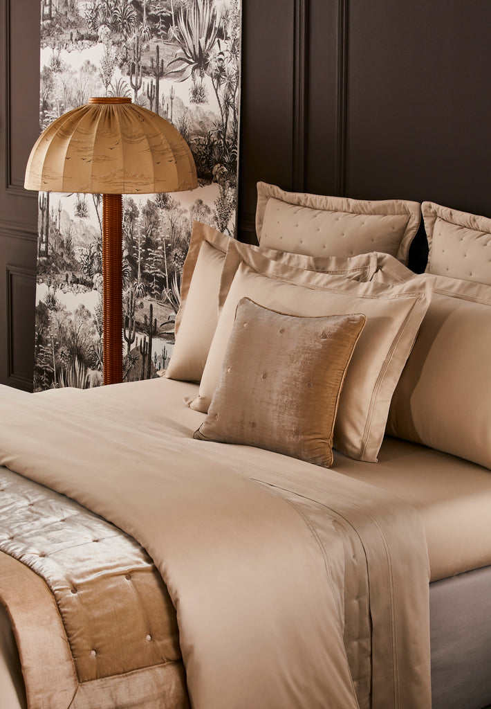 Expertly crafted in France, the Triomphe Sheets, Duvet Covers + Shams offer luxurious comfort and elegant style. Made with 100% long staple combed organic cotton sateen and a silky finish, these sheets and duvet covers feature a soft and lightweight design.