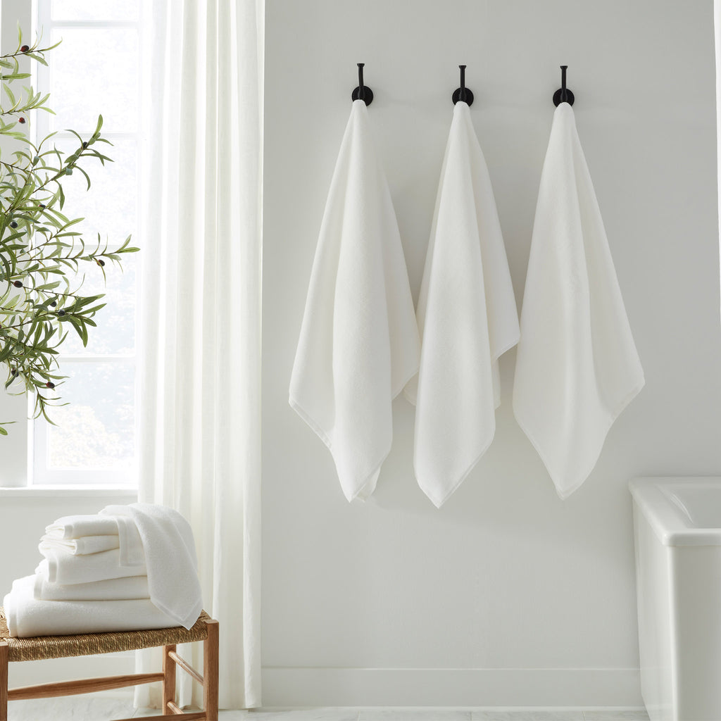 Experience the ultimate in comfort with Sferra's Cielo bath towels and tub mat. Made with the finest long staple cotton and zero-twist yarn, Cielo towels are incredibly absorbent and feel weightless. A heavenly softness that shines with a lustrous surface and catches the light. Indulge in luxury every time you use them.