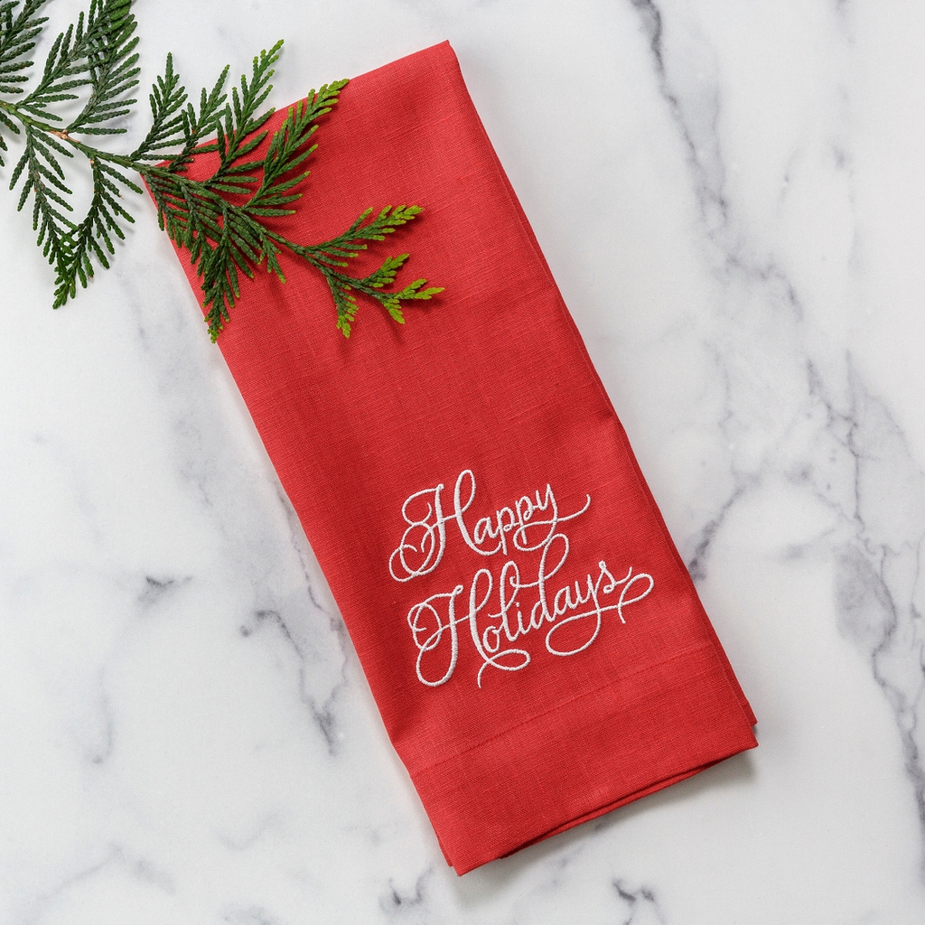 This exquisite 100% European red linen towel is intricately embroidered with the phrase "Happy Holidays," adding a touch of elegance to any kitchen or bath. Measuring 17x29", this towel is versatile and perfect for dressing up any part of your home. Made in Ukraine with high-quality materials, it's both beautiful and durable.