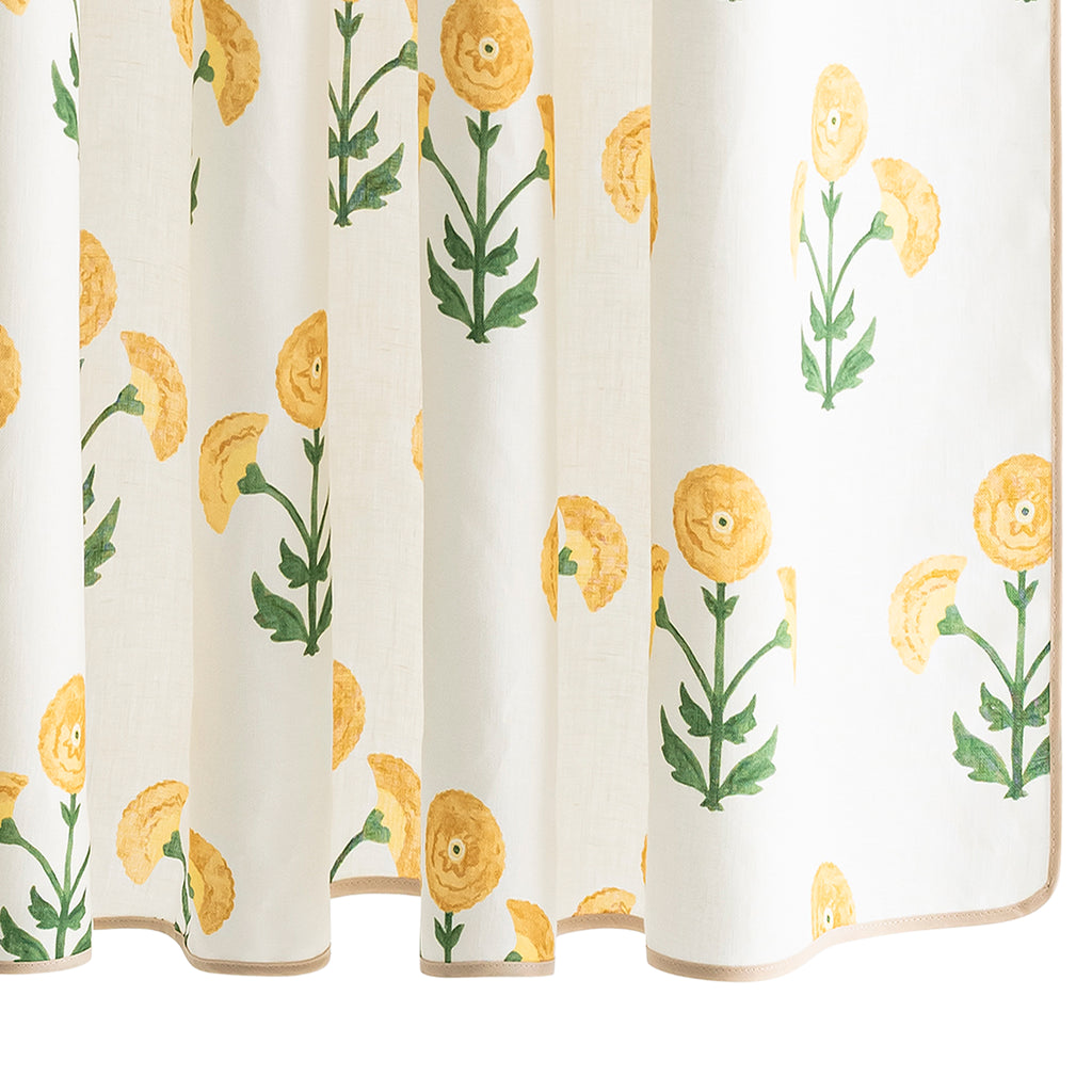 Indulge in luxury with the whimsical and sophisticated Gisele Shower Curtain. Made from 100% linen, this Schumacher block print-inspired design features bright and bold Marigold yellow color and a straight edge with tape binding. Elevate your bathroom with style and charm.