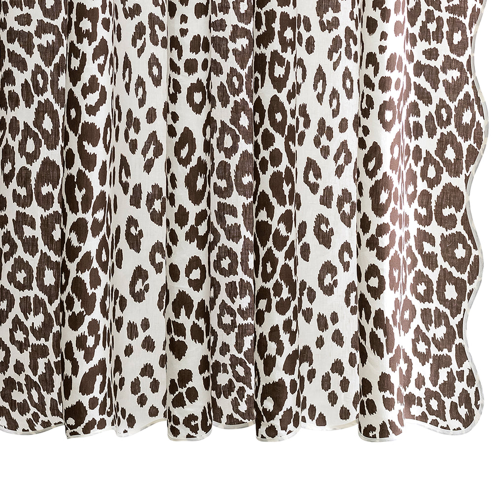 Sassy and chic. Schumacher's Iconic Leopard design is printed on Matouk's linen and finished with a scalloped and taped edge. Add a bit of flair to your bathroom with this sophisticated animal print shower curtain.