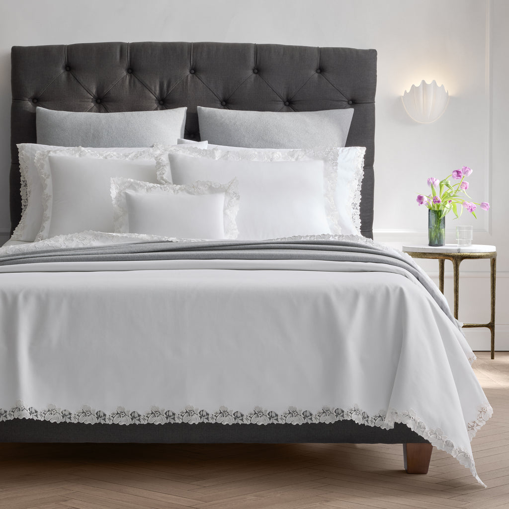 Simple elegance is created with Matouk's Virginia Lace Pique Coverlet + Shams. Made from 100% cotton pique with exquisite Swiss lace detailing, this lightweight coverlet adds a feminine and romantic touch to any bed.