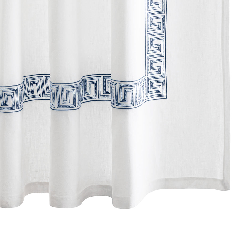 The Ophelia Shower Curtain by Matouk features a timeless Greek key pattern crafted from 100% linen. The embroidered Indigo Blue  lines and dots add a touch of elegance to any bathroom. Inspired by Schumacher's beaded tape, this curtain offers a classic look that is both refined and beautiful.