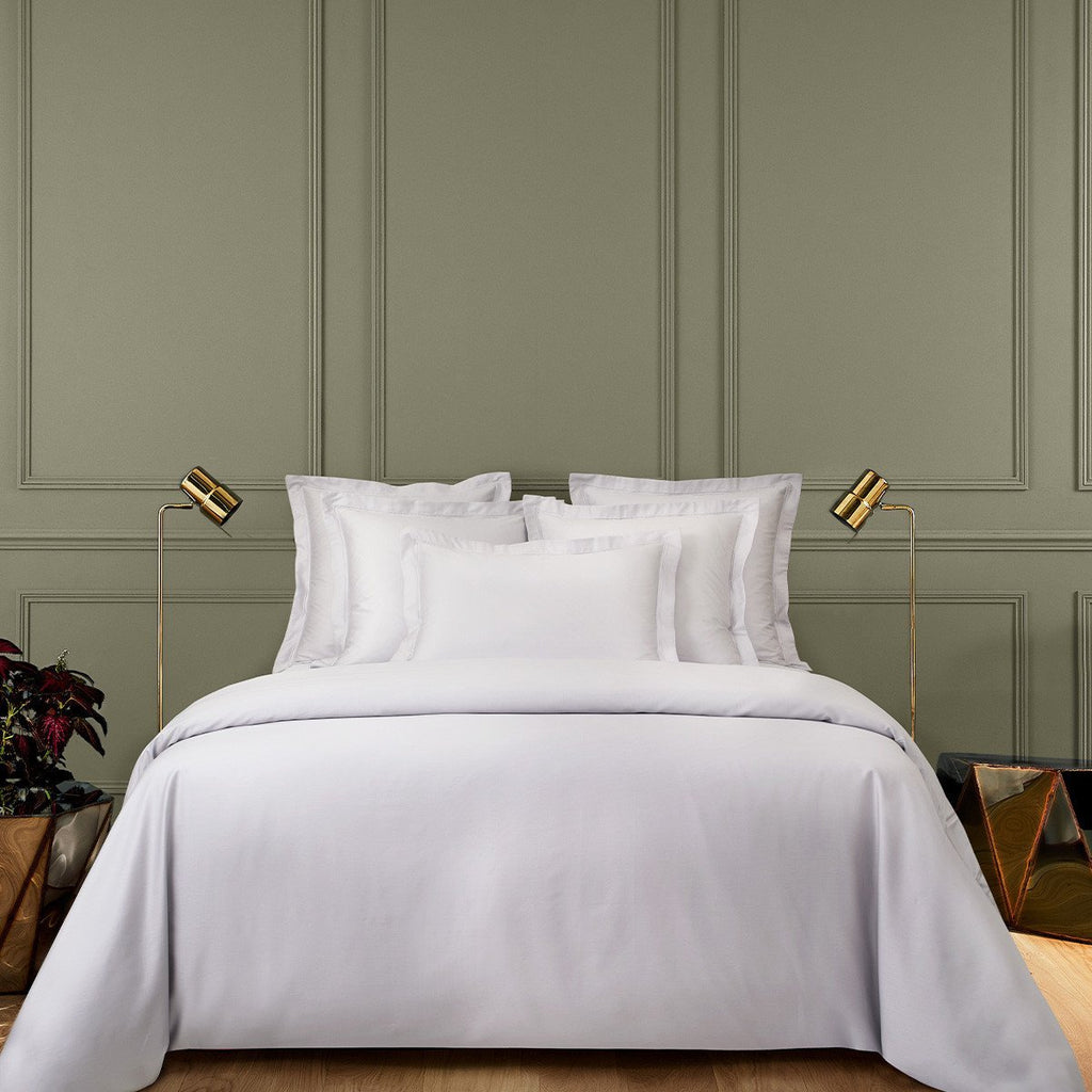 Expertly crafted in France, the Triomphe Sheets, Duvet Covers + Shams offer luxurious comfort and elegant style. Made with 100% long staple combed organic cotton sateen and a silky finish, these sheets and duvet covers feature a soft and lightweight design.